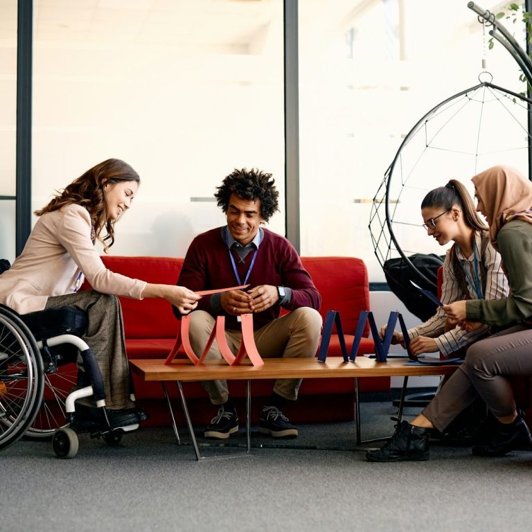 A photograph of a group of people from diverse backgrounds